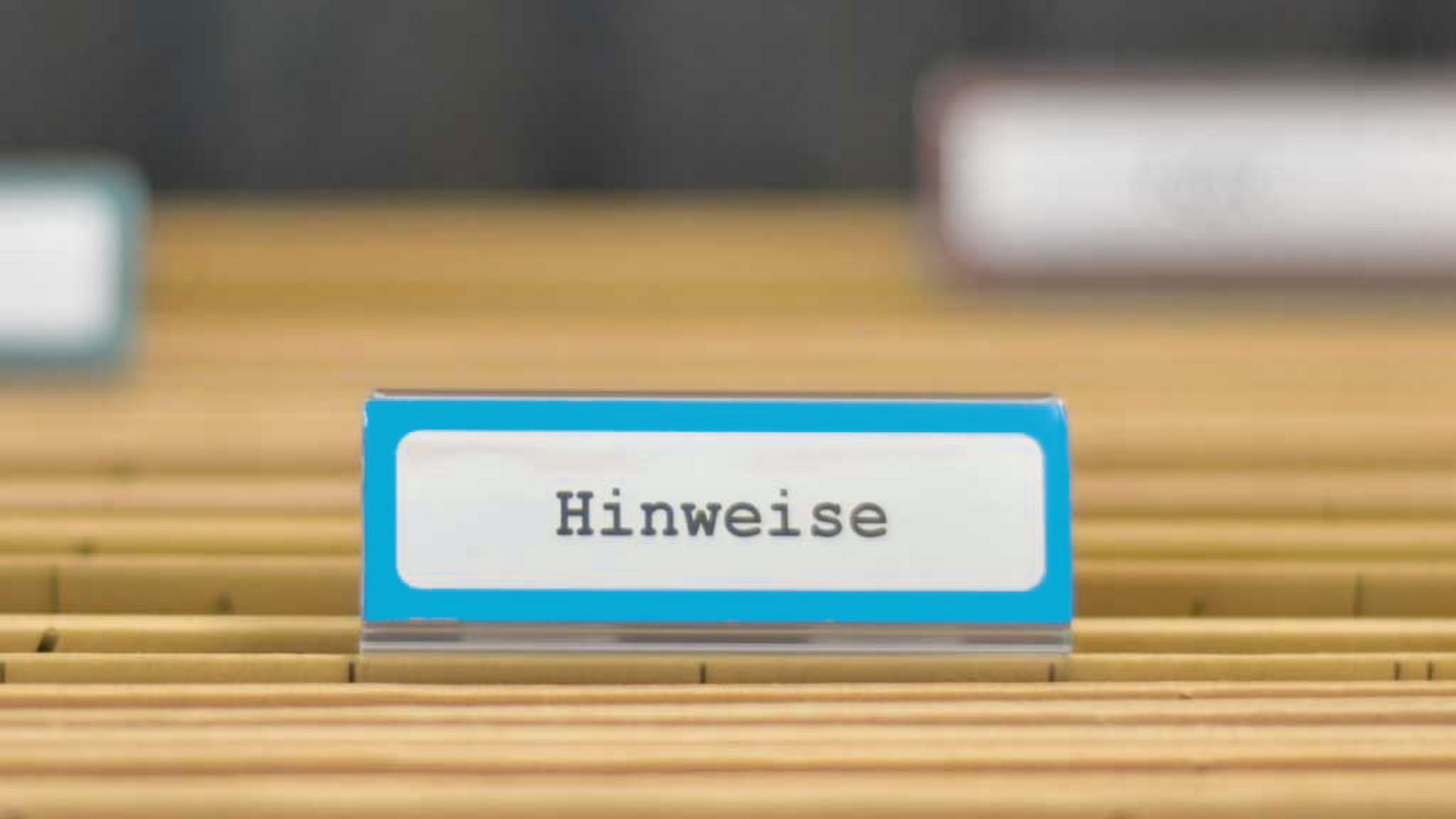 Hängeregister mit der Beschriftung Hinweise